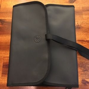 Chanel makeup roll up bag